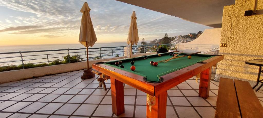 Biliár nebo kulečník v ubytování Amplia terraza en primera linea, Playa Amarilla