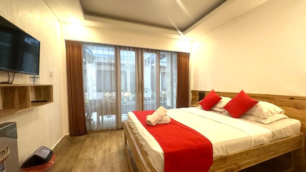 Postel nebo postele na pokoji v ubytování Abian Srama Hotel and Spa