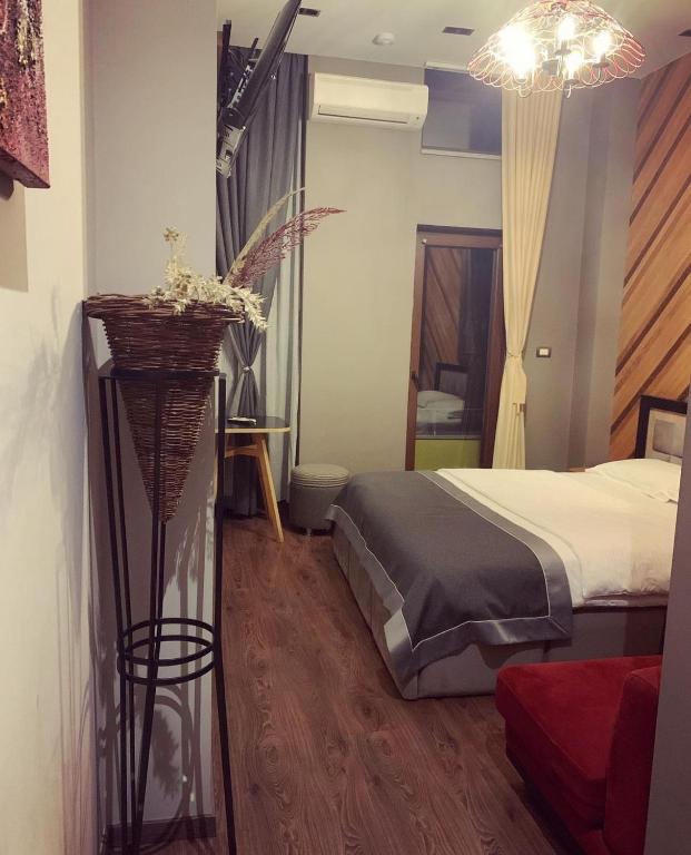 Postel nebo postele na pokoji v ubytování Guest House People