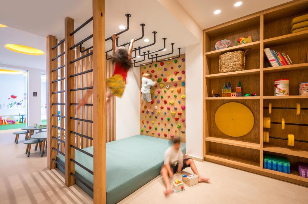 Łóżko lub łóżka w pokoju w obiekcie Arminda Hotel & Spa