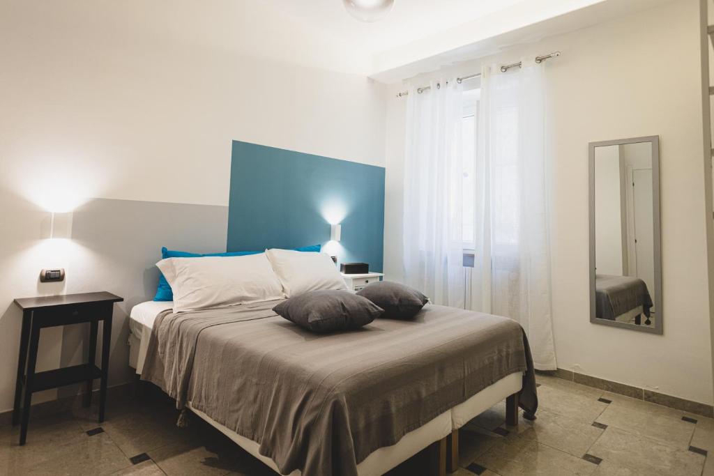 Postel nebo postele na pokoji v ubytování Piazza Verdi B&B