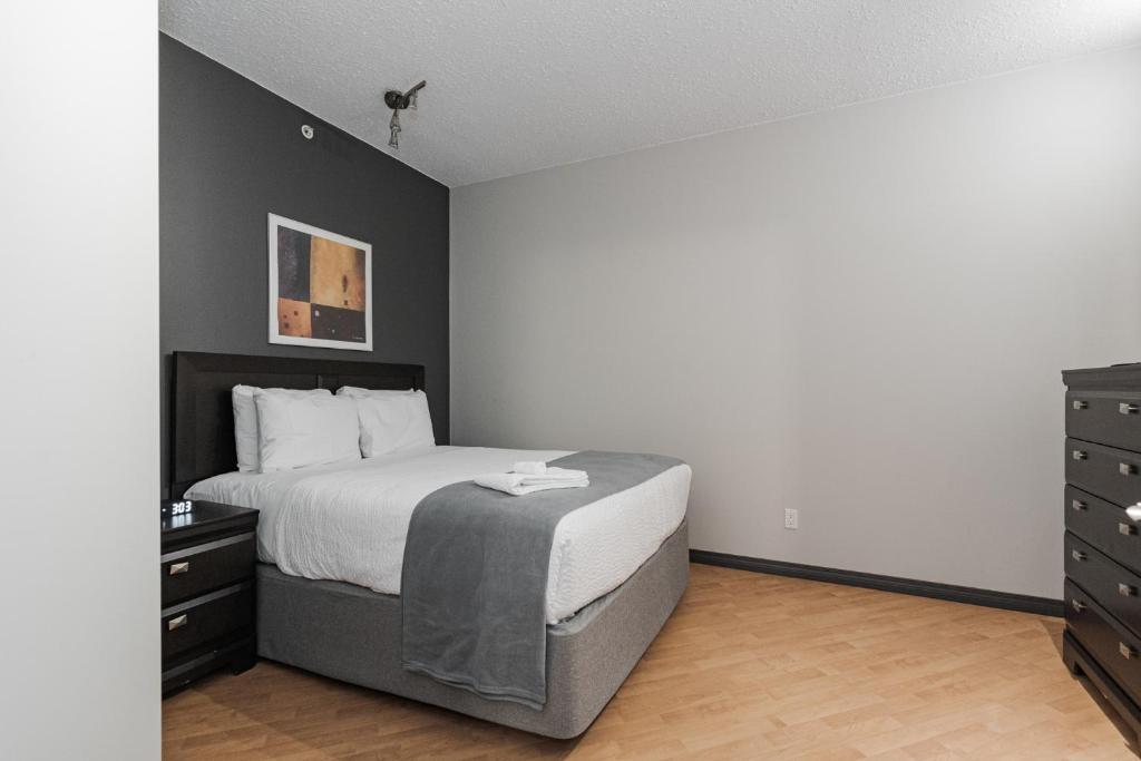 Postel nebo postele na pokoji v ubytování Premier Residence - Fort McMurray