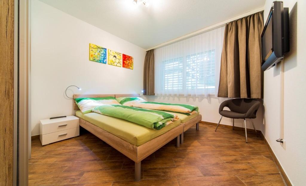 Postel nebo postele na pokoji v ubytování Residenz Ambassador B13