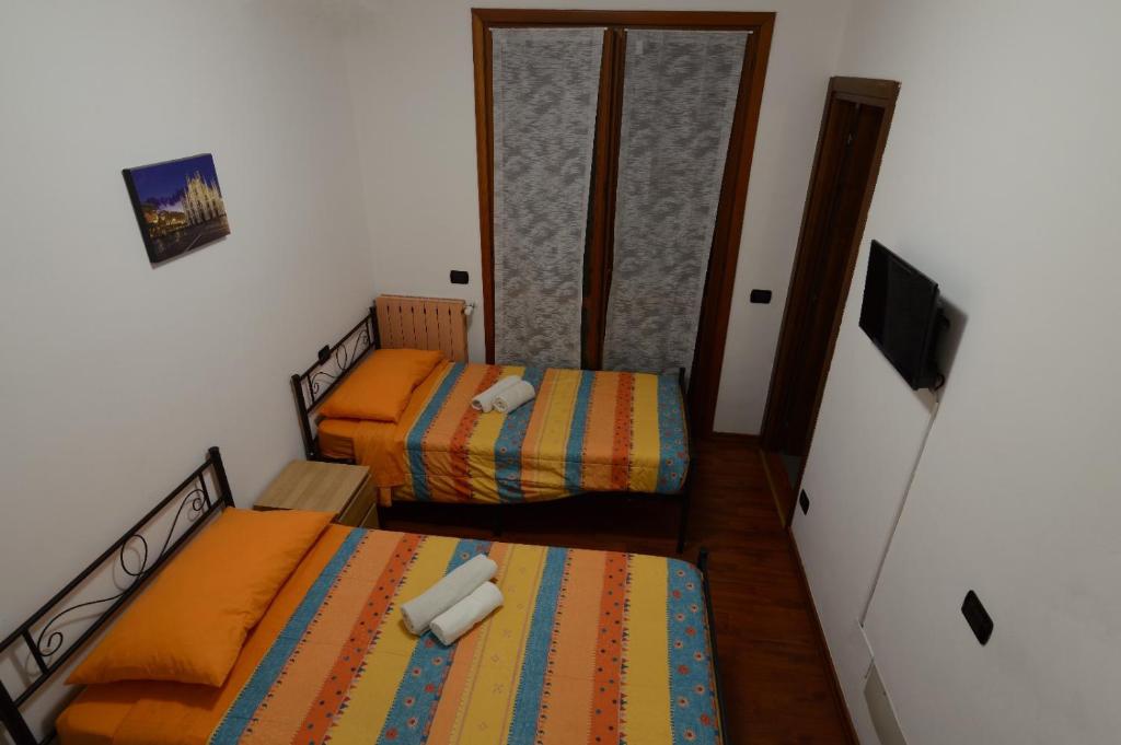 Postel nebo postele na pokoji v ubytování BBgreen