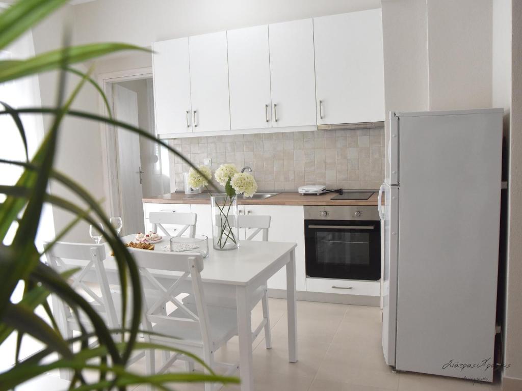 Kuchyňa alebo kuchynka v ubytovaní Supreme City Heart Suites