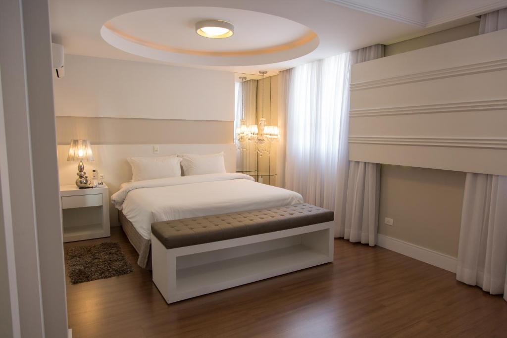 Postel nebo postele na pokoji v ubytování Hotel Princess