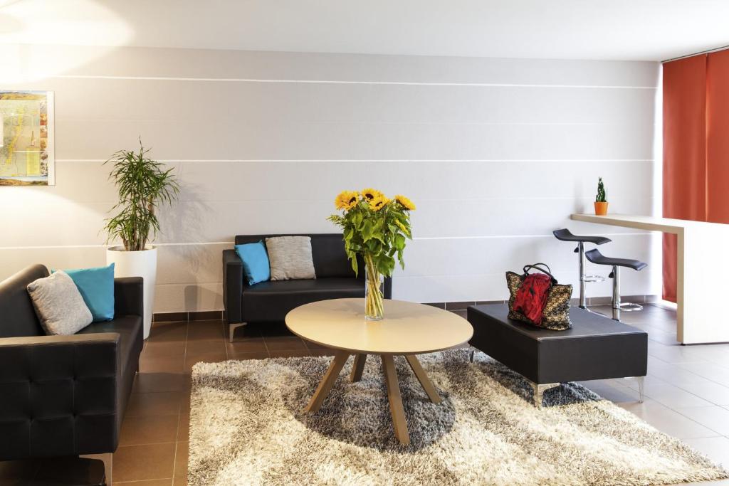 Posezení v ubytování Aparthotel Adagio Access Saint Louis Bâle