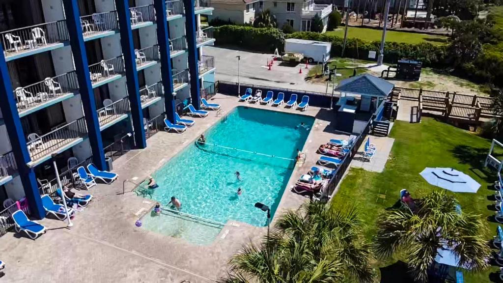 an aerial view of a swimming pool at a resort at Grande Shores in Myrtle Beach