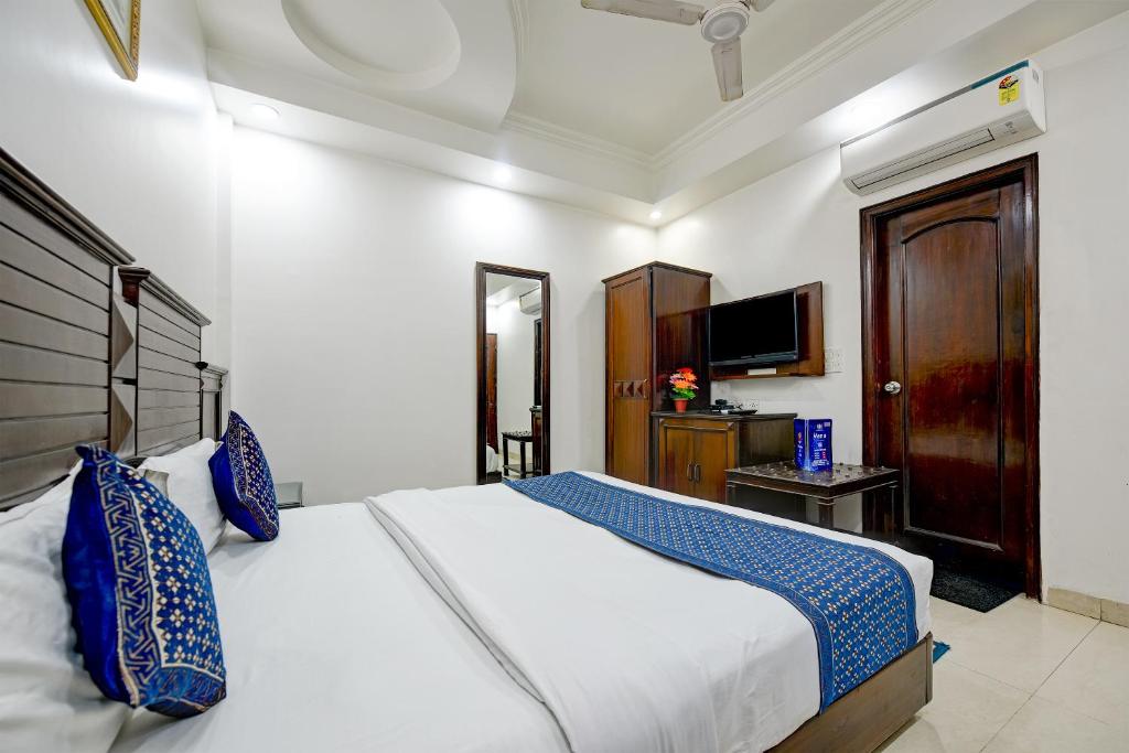 Postel nebo postele na pokoji v ubytování Hotel Legend International - 02 Mins from New Delhi Station