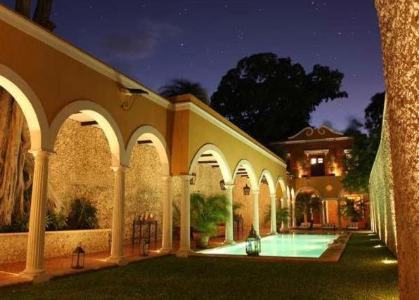 Bazén v ubytování Hotel Hacienda Mérida VIP nebo v jeho okolí