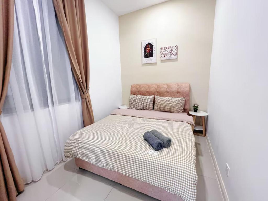 Postel nebo postele na pokoji v ubytování D'Pristine Medini Johor Bahru