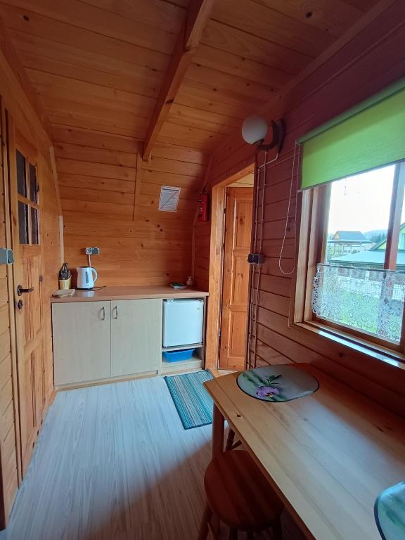 Kuchyň nebo kuchyňský kout v ubytování Domki Letniskowe u Karola