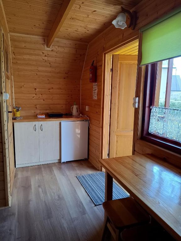 Kuchyň nebo kuchyňský kout v ubytování Domki Letniskowe u Karola
