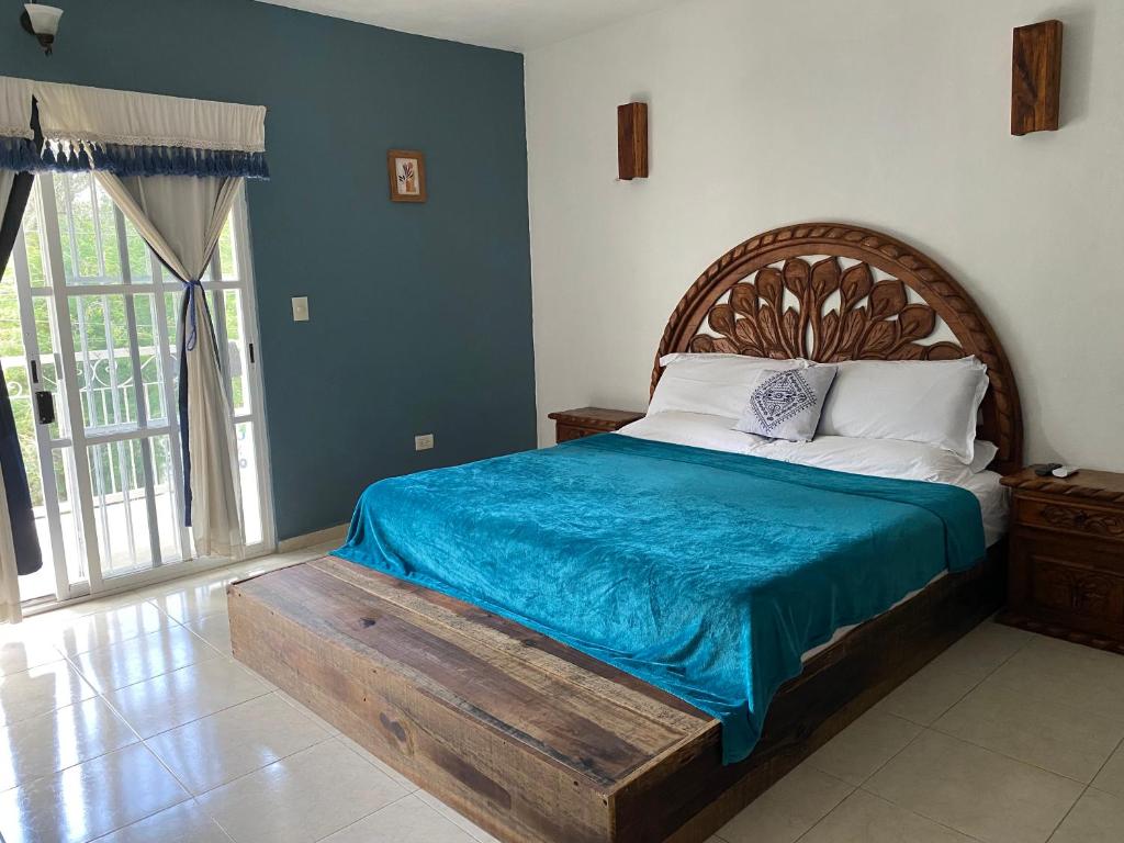 Ένα ή περισσότερα κρεβάτια σε δωμάτιο στο Casa X'Lapac