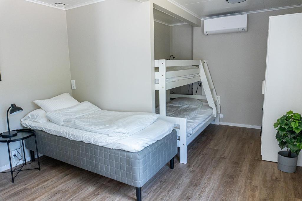Postel nebo postele na pokoji v ubytování Perchlodge