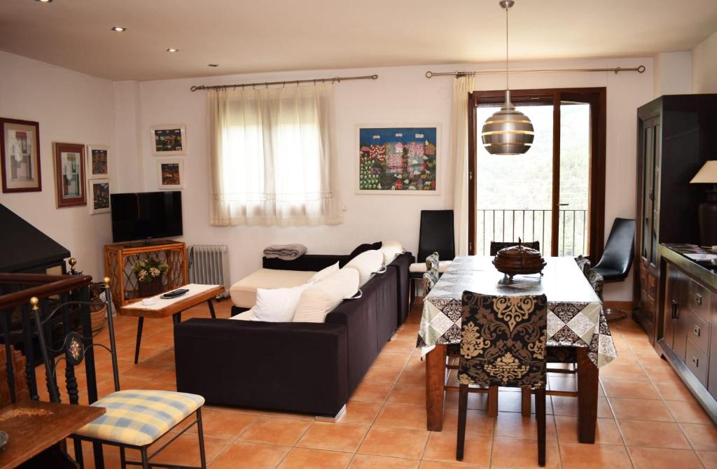 TV a/nebo společenská místnost v ubytování Apartamento rural "LA MUELA"