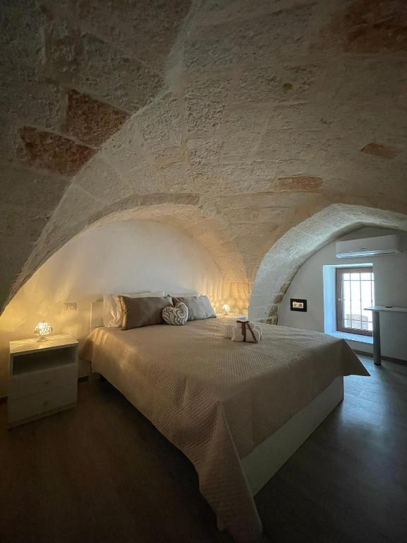 Postel nebo postele na pokoji v ubytování A casa a Fasano