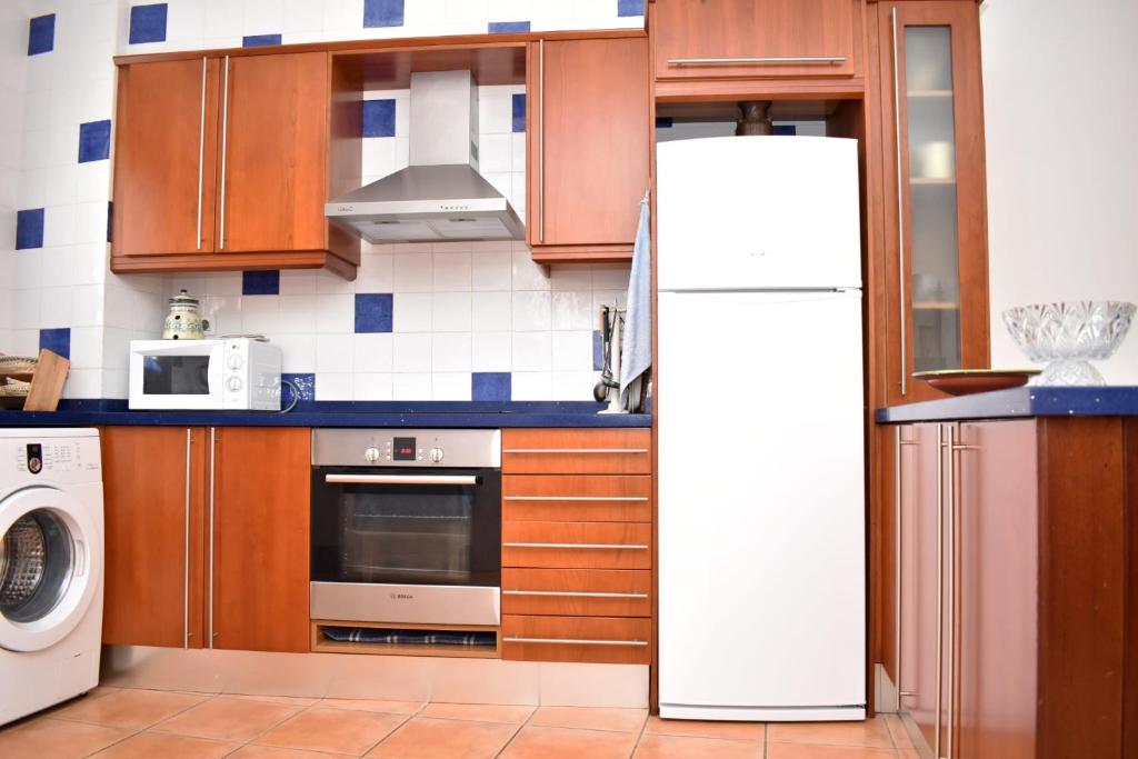 Kuchyň nebo kuchyňský kout v ubytování Apartamento rural "LA MUELA"