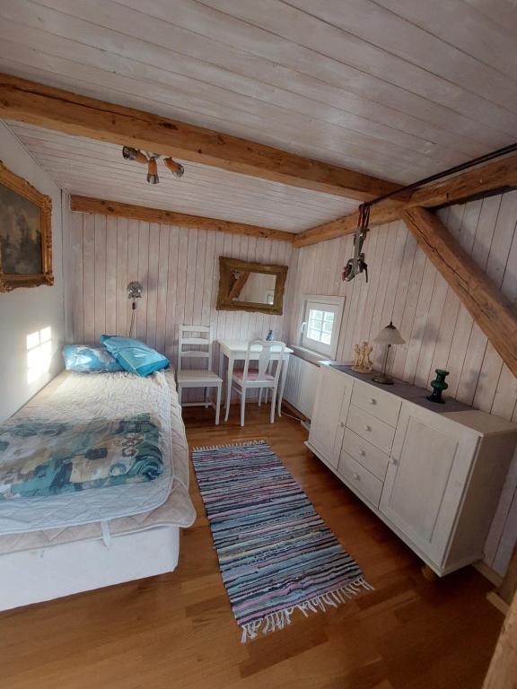 Postel nebo postele na pokoji v ubytování Magasinet