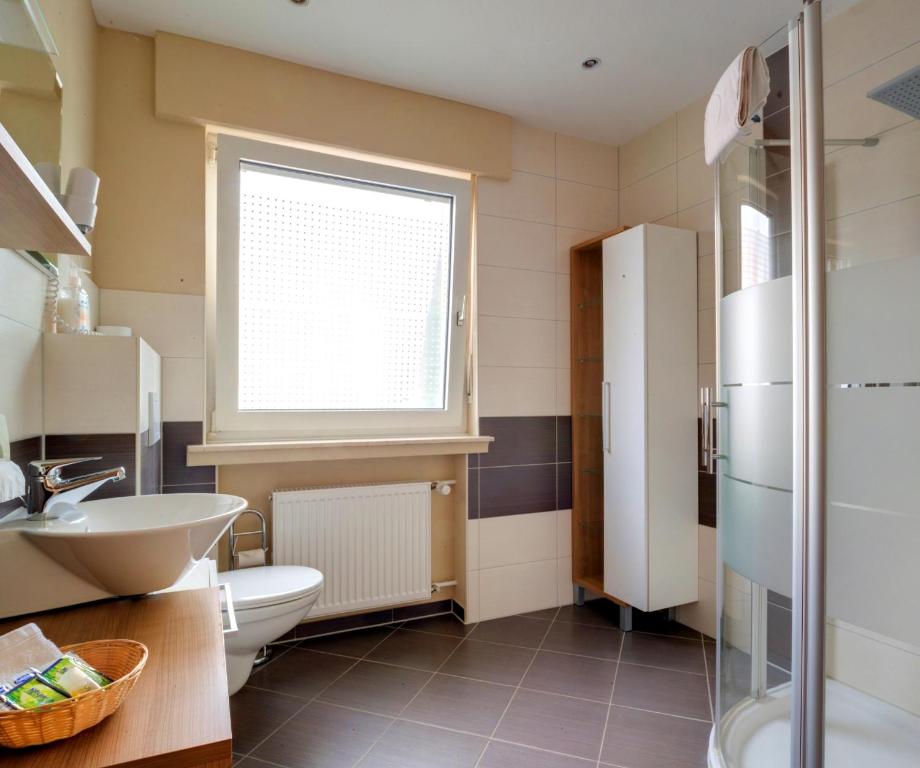Kuchyň nebo kuchyňský kout v ubytování Hotel Heide Residenz