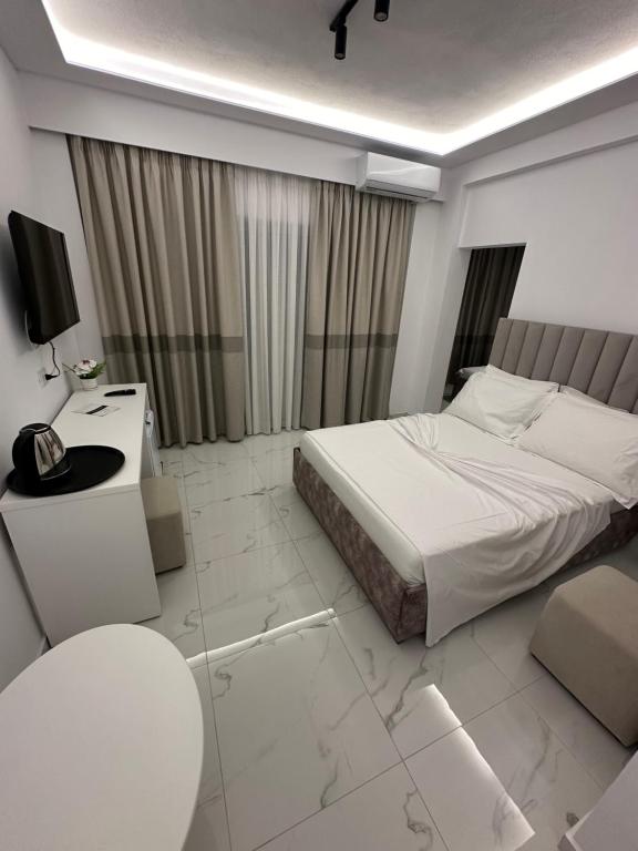 Postel nebo postele na pokoji v ubytování Hotel Elisabet