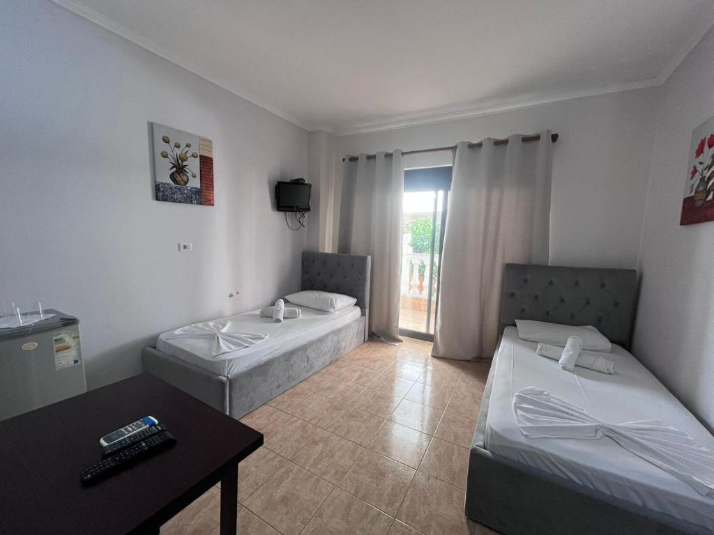 Postel nebo postele na pokoji v ubytování Hotel Primavera