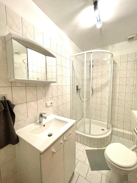 Koupelna v ubytování VIKTORIA RESIDENCE