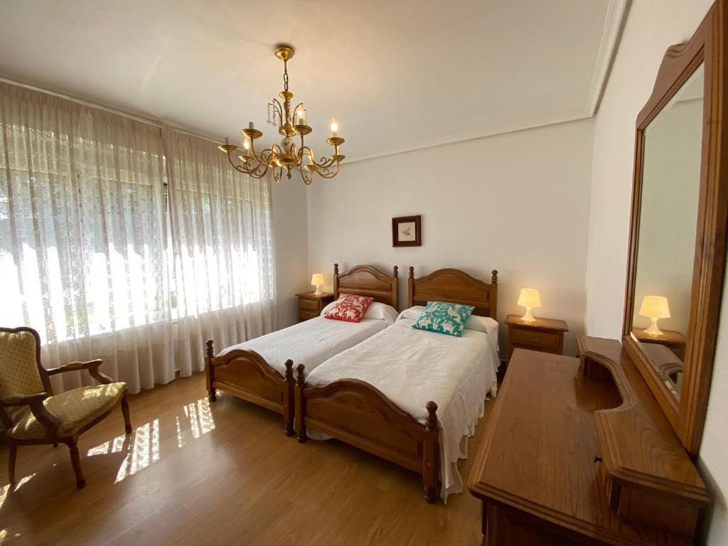 Ένα ή περισσότερα κρεβάτια σε δωμάτιο στο Villa Sarin