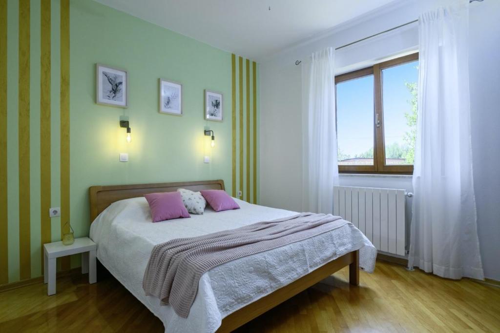 Posteľ alebo postele v izbe v ubytovaní Istria Rosa in Pula - Istrien
