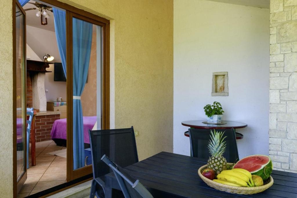 Televízia a/alebo spoločenská miestnosť v ubytovaní Istria Rosa in Pula - Istrien
