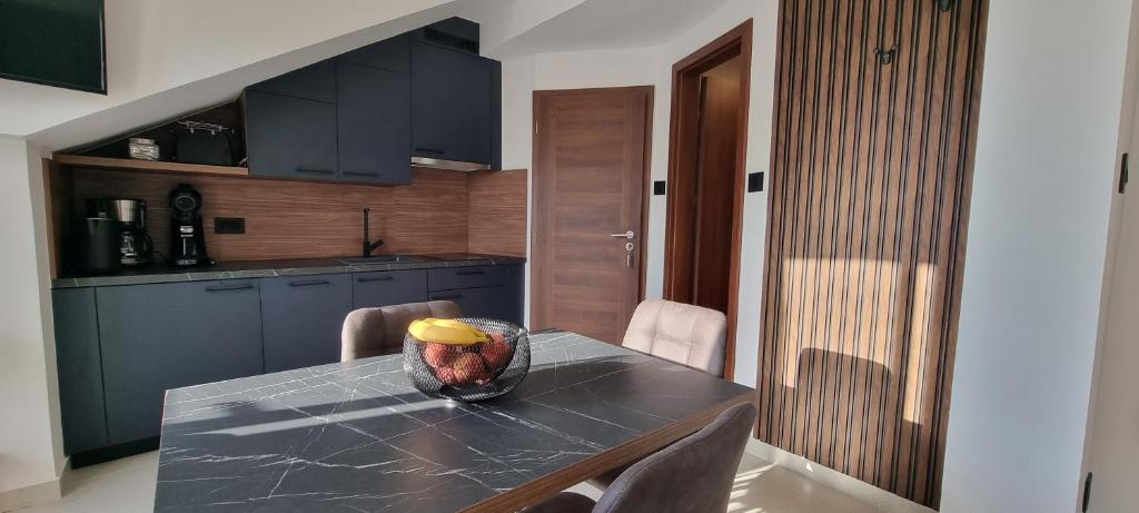 Kuchyň nebo kuchyňský kout v ubytování Apartman MILA TAR