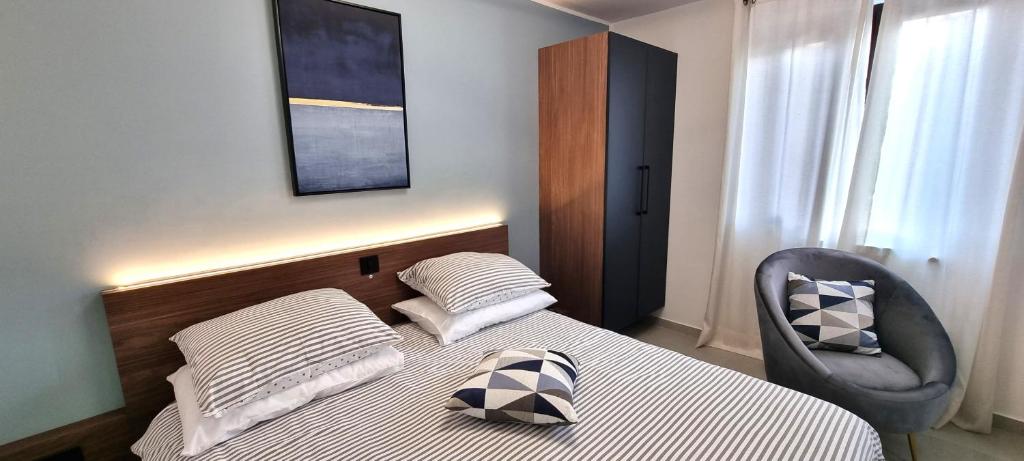 Postel nebo postele na pokoji v ubytování Apartman MILA TAR