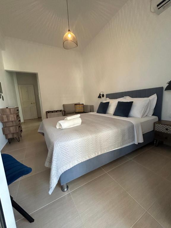 Postel nebo postele na pokoji v ubytování KavirosHome