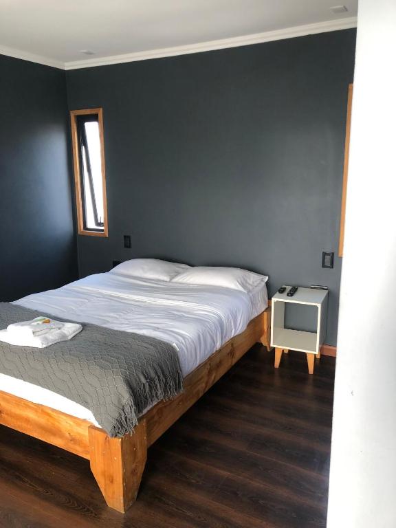 Postel nebo postele na pokoji v ubytování Chagual Los Vilos Lodging