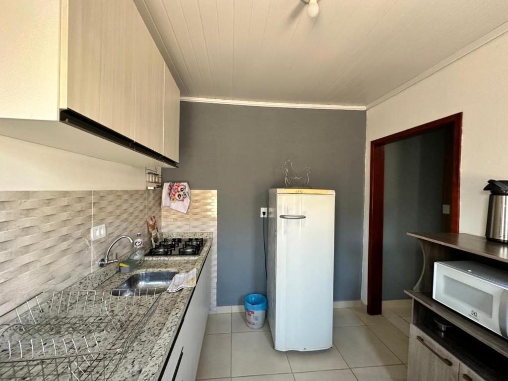 Kuchyň nebo kuchyňský kout v ubytování Casa Completa