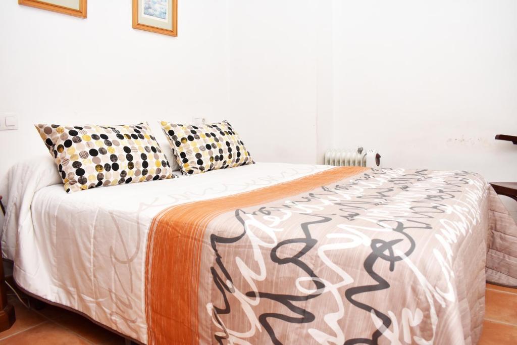 Postel nebo postele na pokoji v ubytování Apartamento rural "LA MUELA"