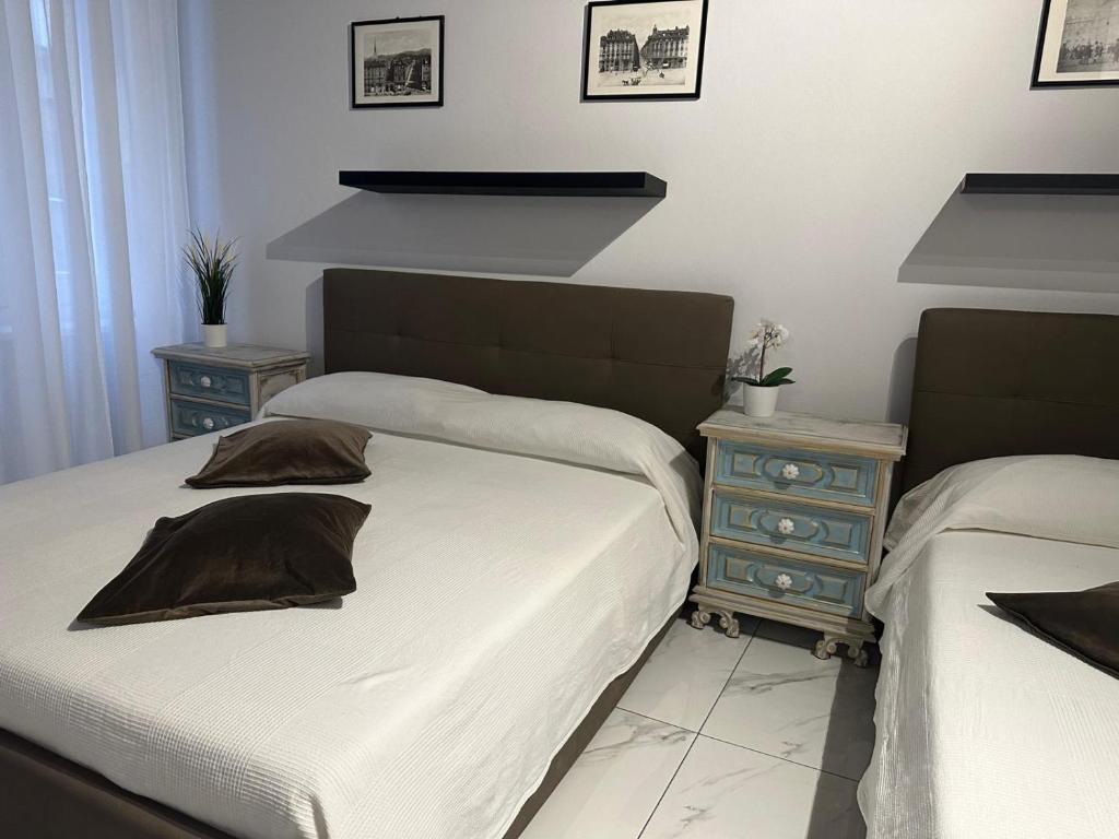 Letto o letti in una camera di Mokai Torino Centro