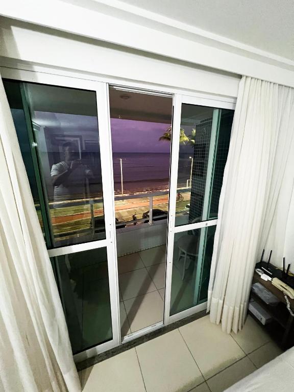 Uma varanda ou terraço em Blue Sunset Beira Mar