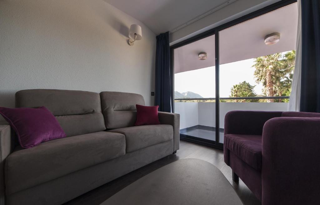 A seating area at Hotel La Palma de Llanes