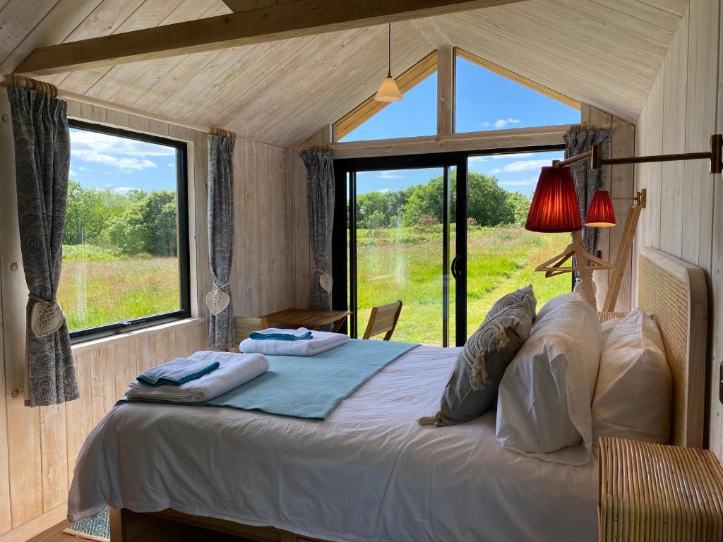 Voodi või voodid majutusasutuse Otterly's Retreat toas
