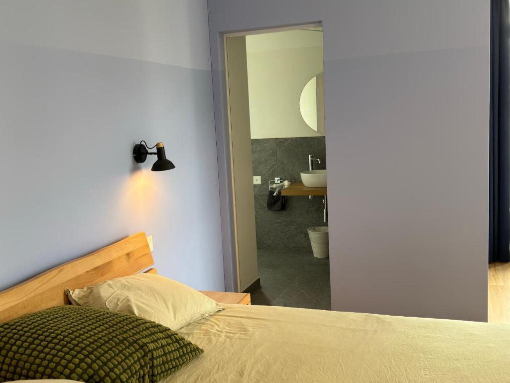 Postel nebo postele na pokoji v ubytování Villa Belforte