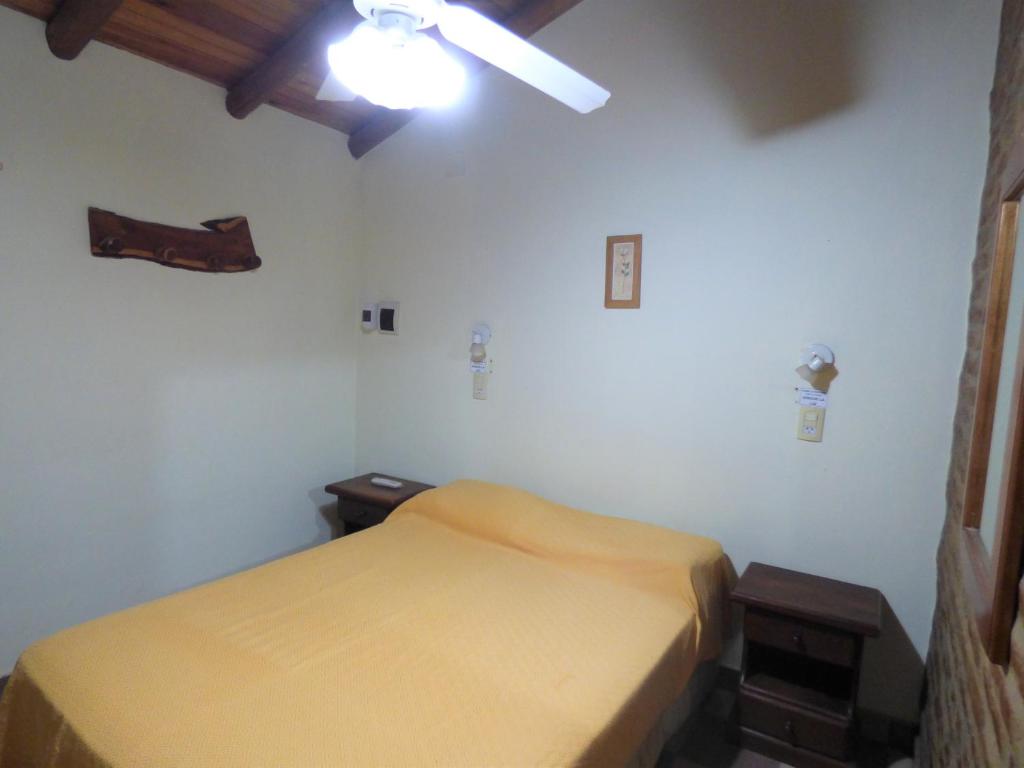 Postel nebo postele na pokoji v ubytování Cabañas EL MOLINO