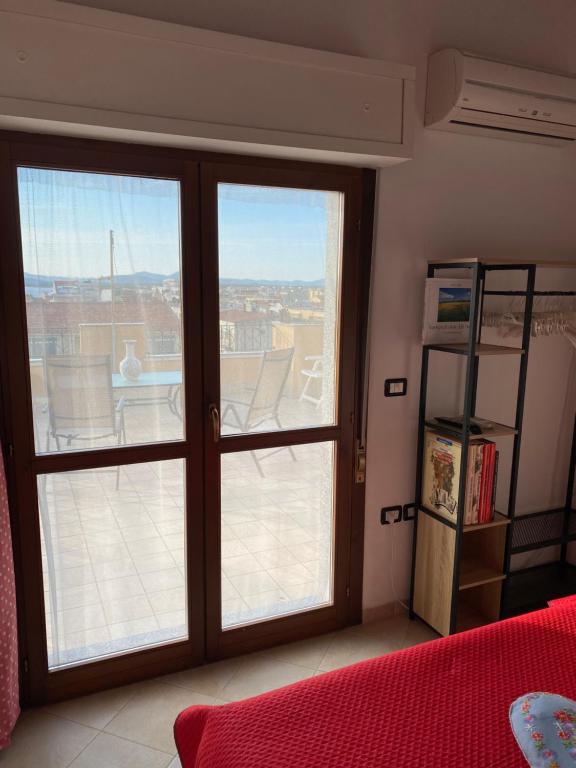 Postel nebo postele na pokoji v ubytování B&B Su Canistreddu