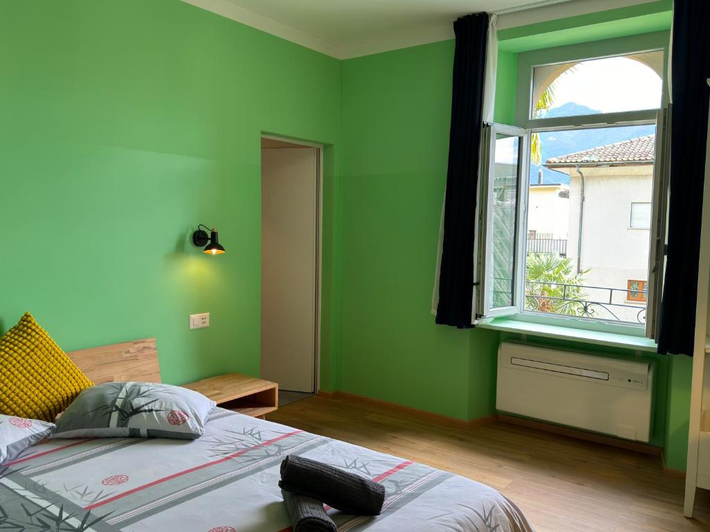 Postel nebo postele na pokoji v ubytování Villa Belforte