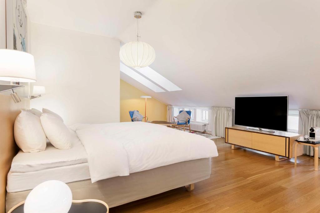 TV a/nebo společenská místnost v ubytování Radisson Blu Aleksanteri Hotel, Helsinki