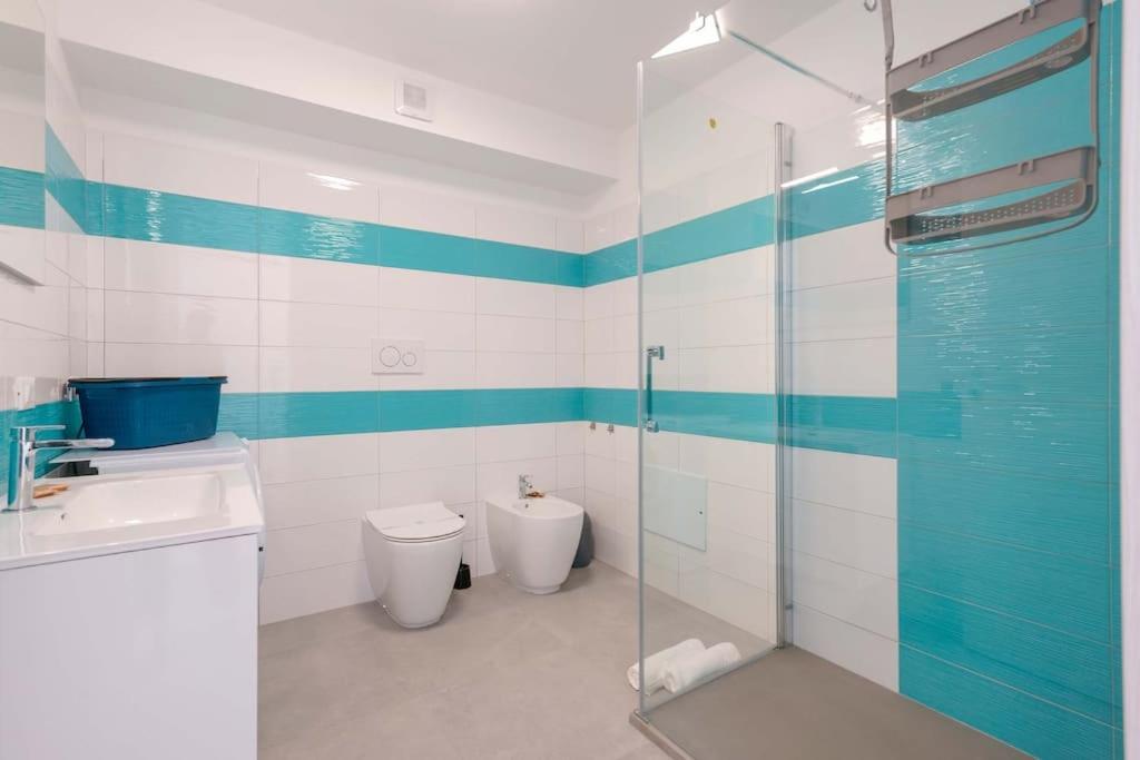 Koupelna v ubytování Il Delfino Guest House