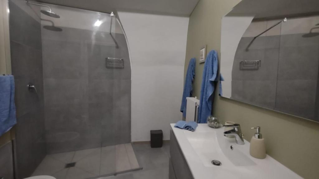 Koupelna v ubytování leuca house