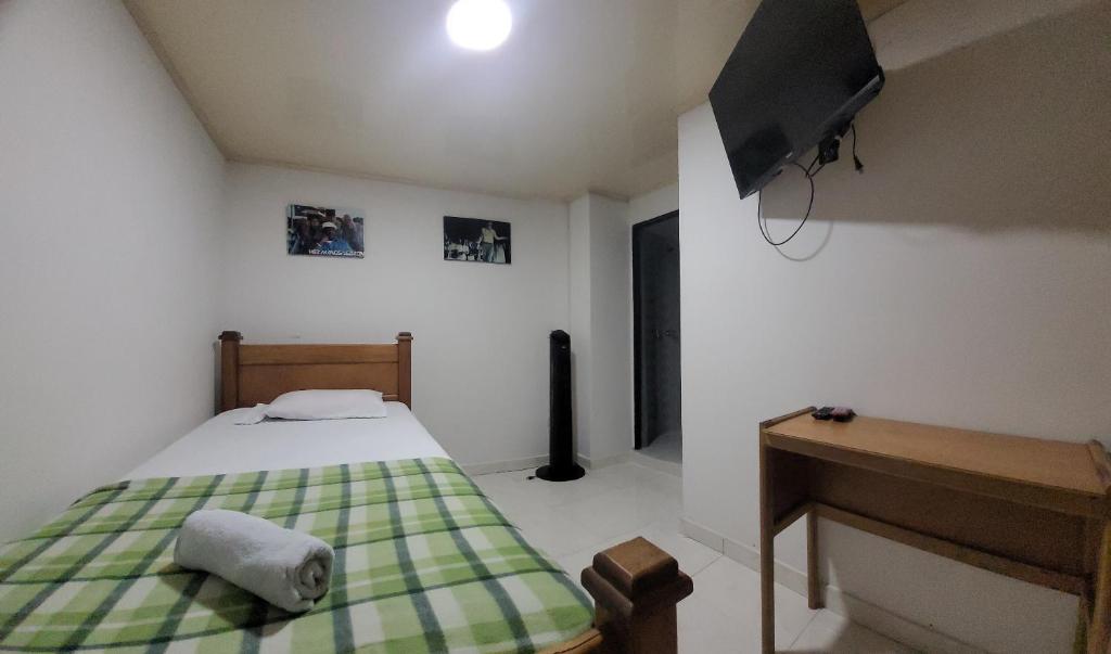 Postel nebo postele na pokoji v ubytování Hotel San Vicente