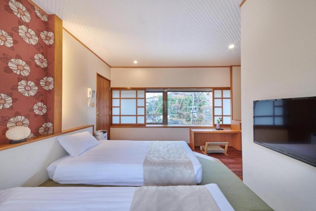 Ichinomatsu Japanese Modern Hotel - Twin Room Met Uitzicht Op De Tuin
