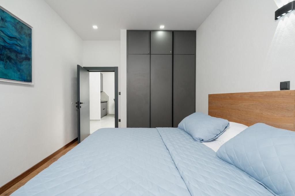 Posteľ alebo postele v izbe v ubytovaní Apartments Kudelik